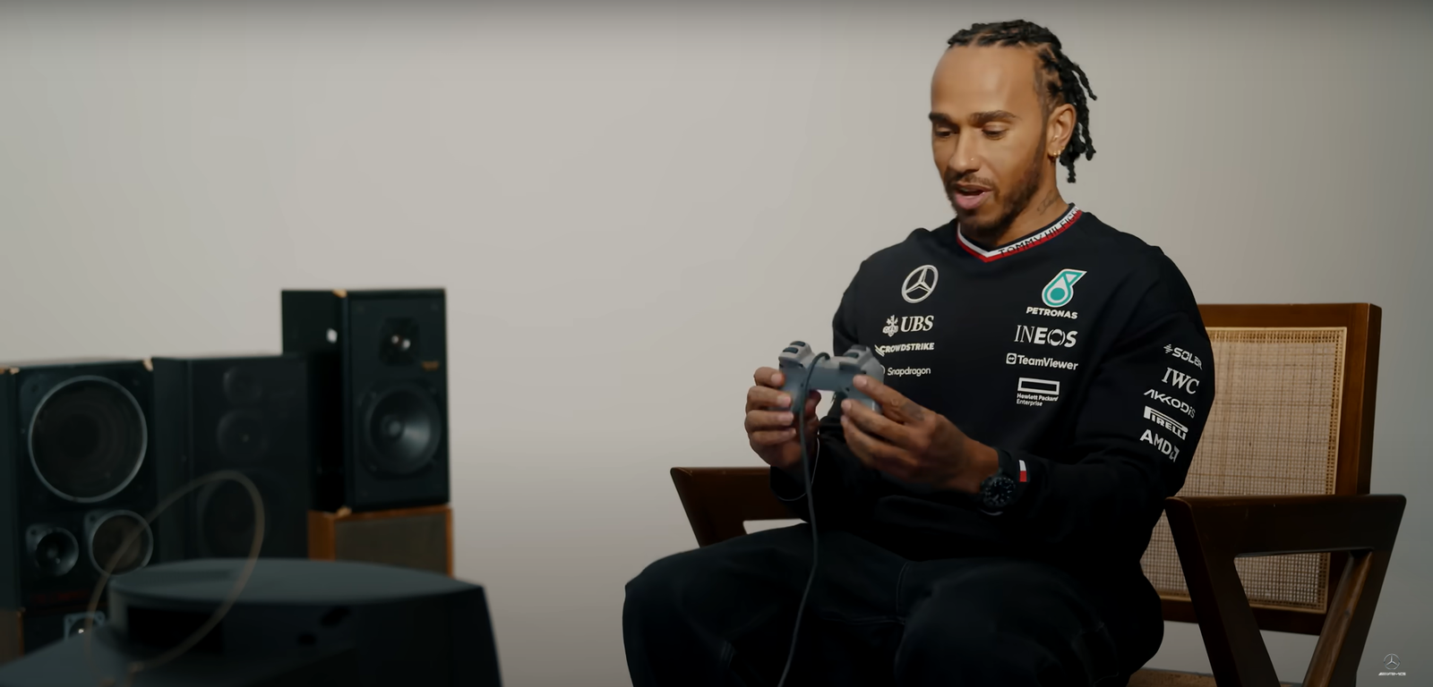 Lewis Hamilton plays retro racing games